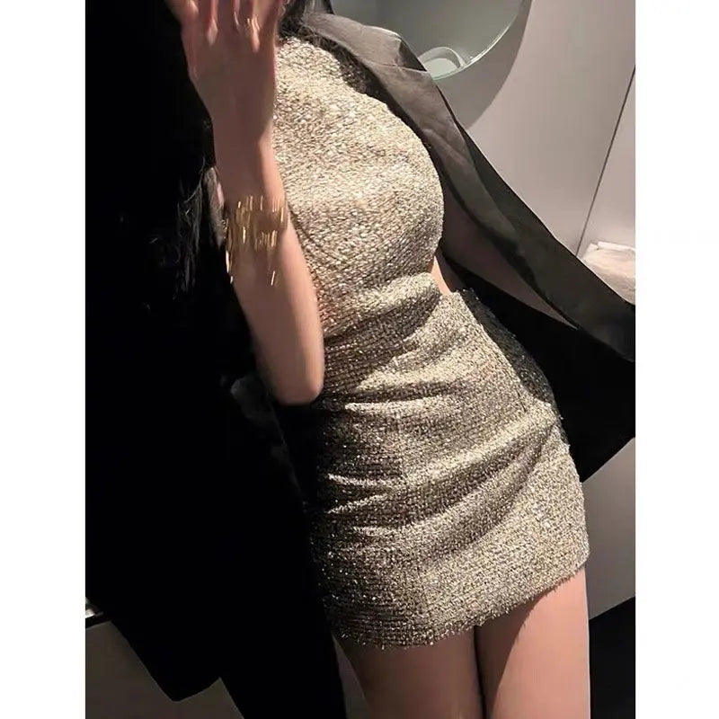 Aiertu  -   Spicy Girl Elegant Hollow Slant Shoulder Sexy Dress Autumn/Winter New Sleeveless Slimming Warp Hip Tight Mini Dress for Women Aiertu