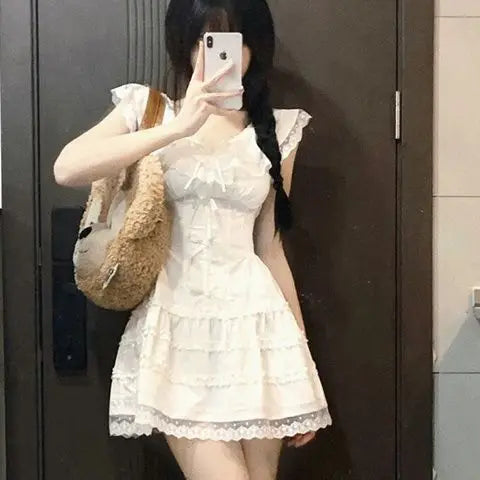 Aiertu Y2k Coquette White Lolita Sweet White Kwaii Cute Mini Dress Women Lace Bow Princess Slip Lace Short Dresses 2024 Fashion Aiertu