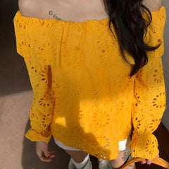 AIERTU  -  Commuter Style One-word Collar Hollow Embroidered Shirt Women's Spring New Ruffle Edge Loose Wear Top Aiertu
