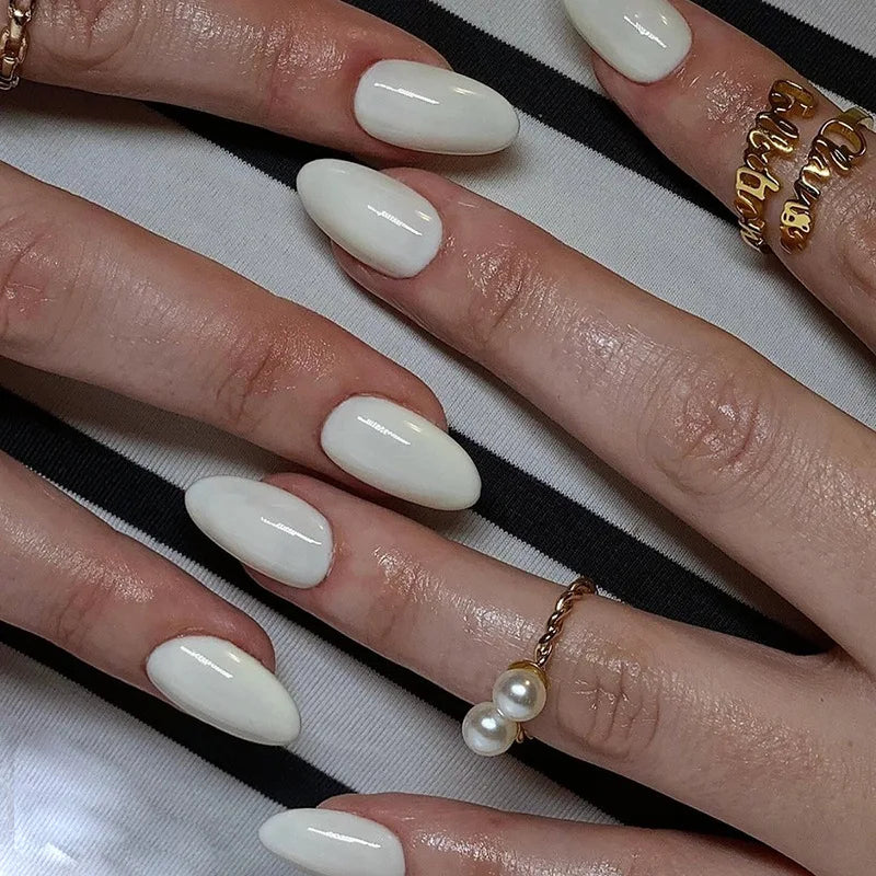 Aiertu 24Pcs Simple Green French False Nails Short Almond Fake Nails with Wave Line Design Wearable Round Head Press on Nail Tips Aiertu