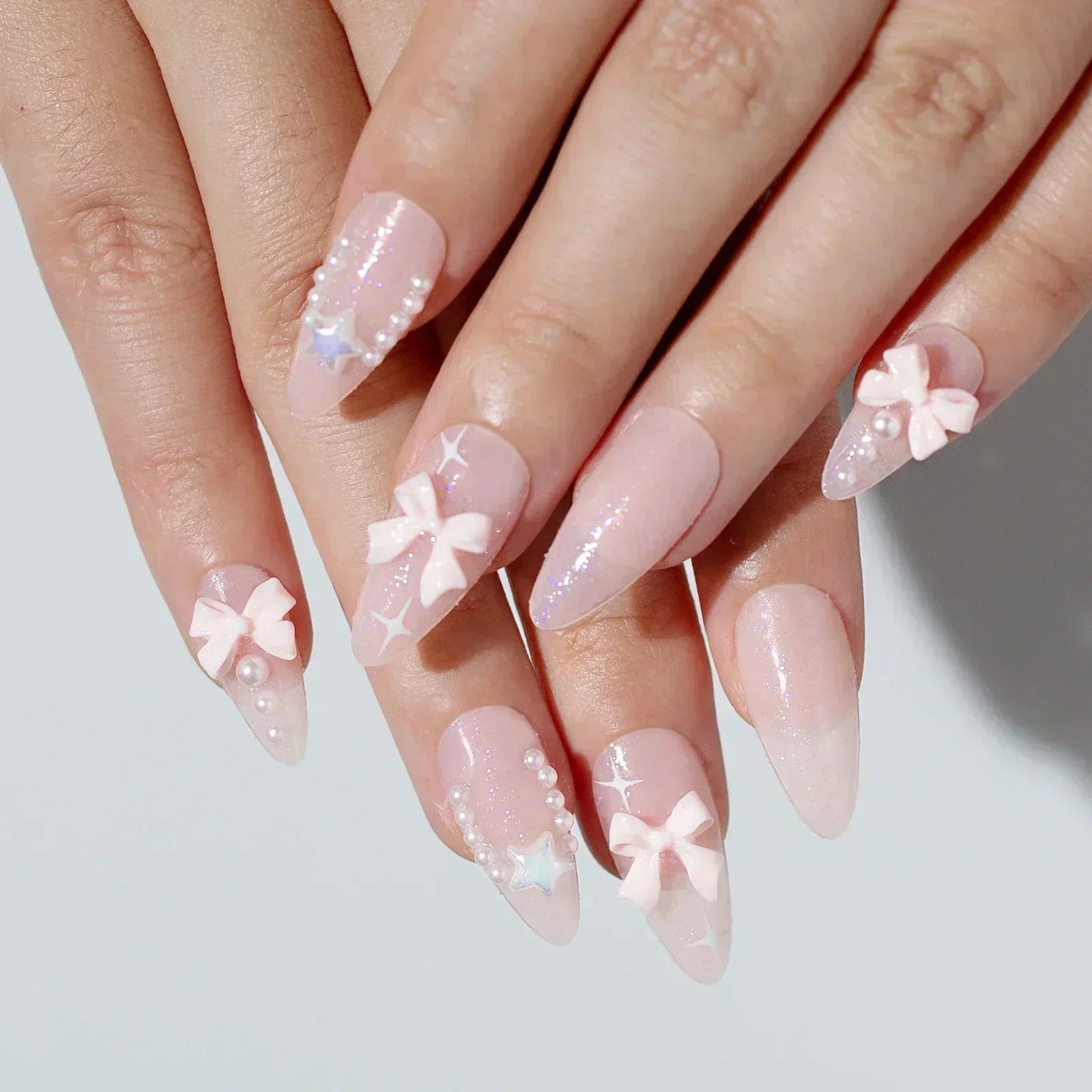 Aiertu 24Pcs Pink Almond French Press on Nails With 3D Bow ripple charms Design Fake Nails Ballerina False Nails Full Cover Nail Tips Aiertu