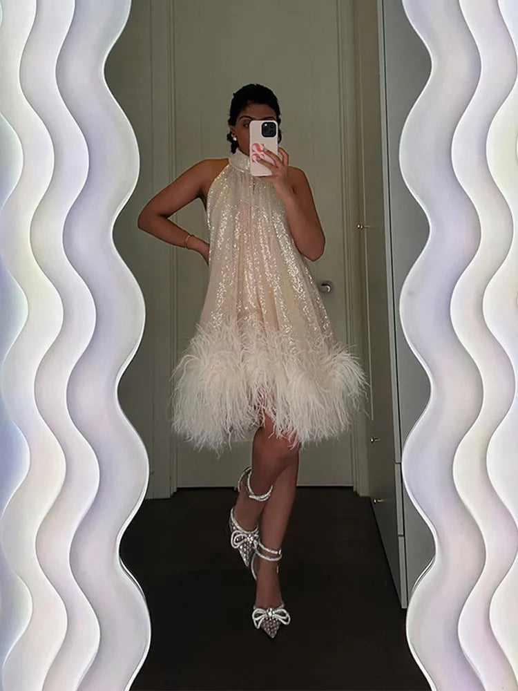 Aiertu  -  Elegant White Sequins Feather Hem Mini Dress Women Sexy Off Shoulder Loose Halter Dresses 2026 New Shiny Female Party Vestidos Aiertu