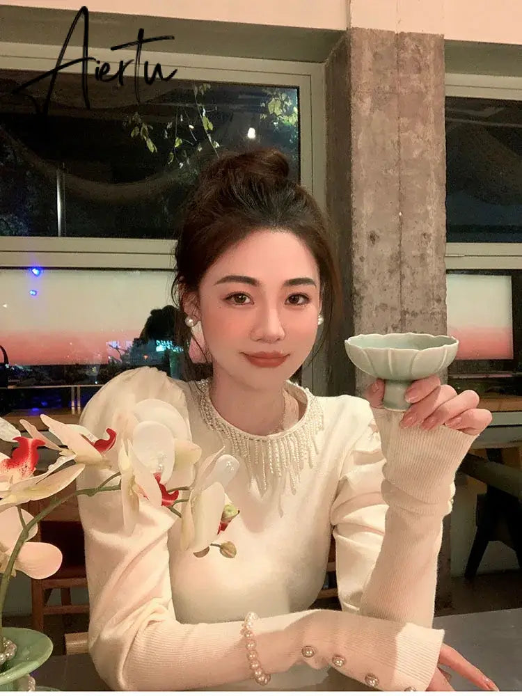 Aiertu French Elegant Pearl Tassel O-neck Bubble Sleeve Women Sweaters Pullovers 2024 Autumn Winter Stretch Female Knitted Tops Jumpers Aiertu