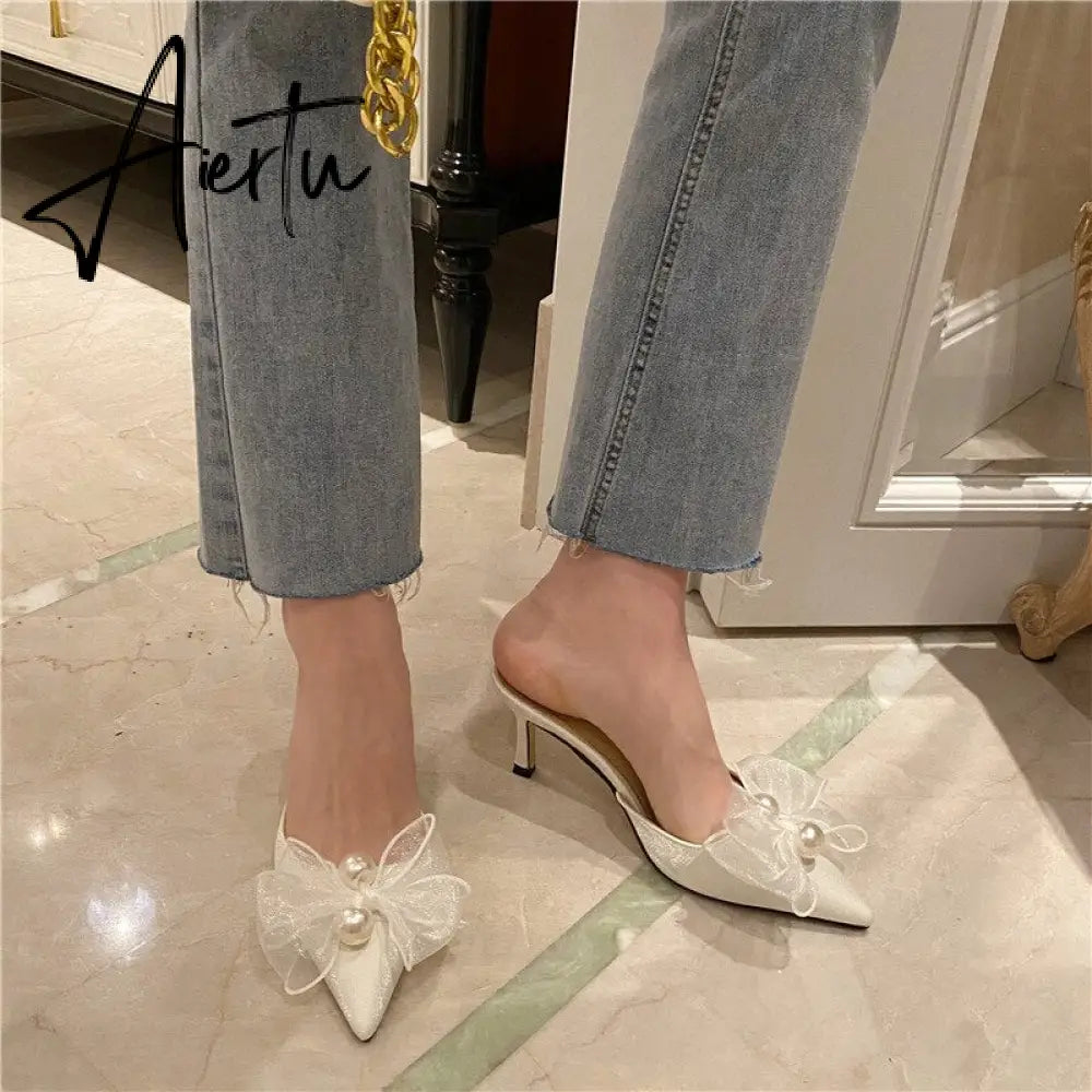 Aiertu New Baotou Half Drag Thin Heel Bow Sandals Pointed Pearl High Heel Muller Shoes Aiertu