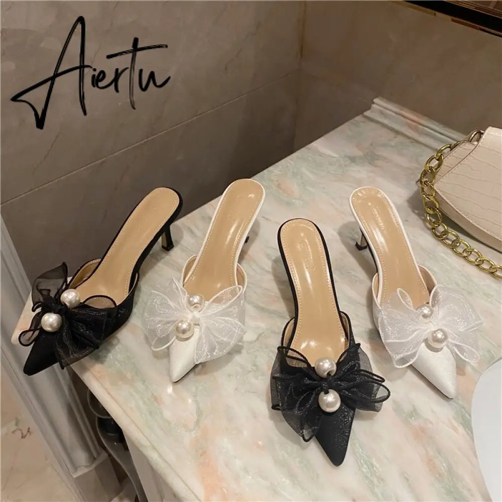 Aiertu New Baotou Half Drag Thin Heel Bow Sandals Pointed Pearl High Heel Muller Shoes Aiertu