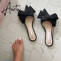 Aiertu spring and summer women's shoes Korean silk satin Pointed bow tie slippers Baotou flat heel sets semi slippers Aiertu