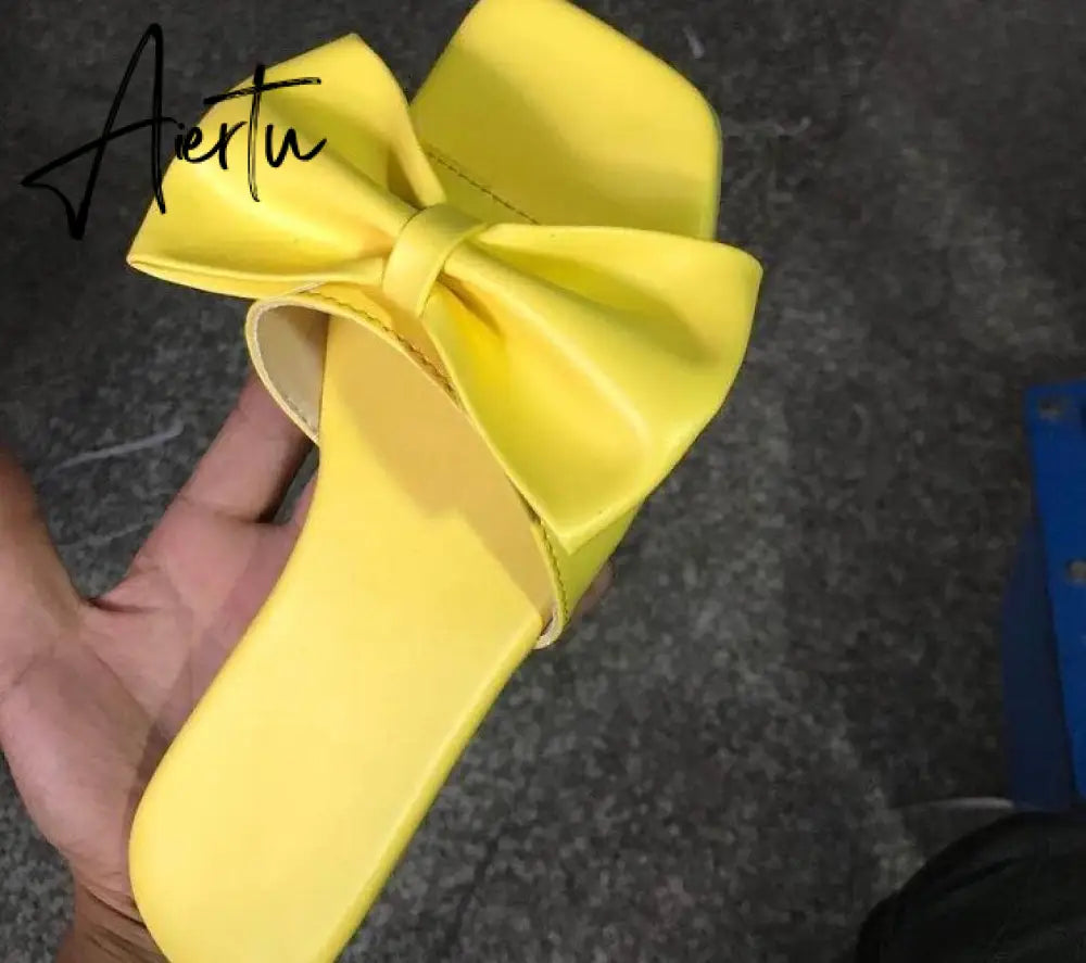 Aiertu  Spring/summer new outdoor flat leather bow non-slip beach lady slippers casual all-match fashion women sandals Aiertu