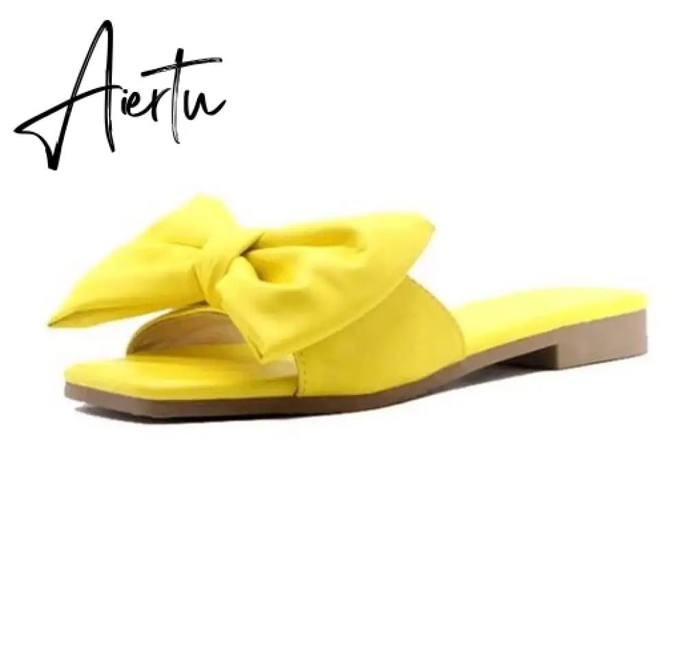 Aiertu  Spring/summer new outdoor flat leather bow non-slip beach lady slippers casual all-match fashion women sandals Aiertu