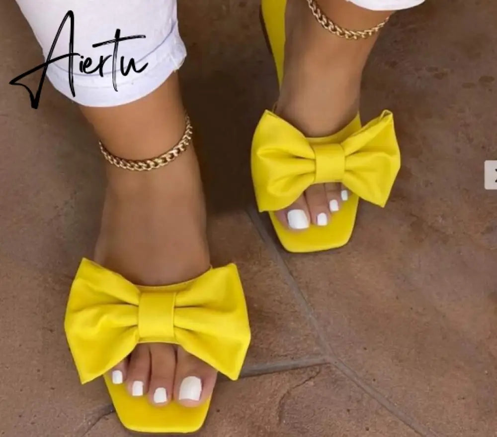 Aiertu  Spring/summer new outdoor flat leather bow non-slip beach lady slippers casual all-match fashion women sandals Aiertu