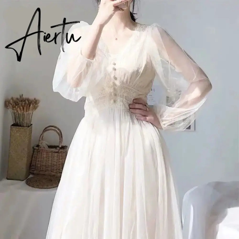 Aiertu Women Spring Dress Vintage Elegant with Button A-Line Dress Solid Puff Sleeve Lace Voile Mesh Dress Women Vestidos 8126 Aiertu