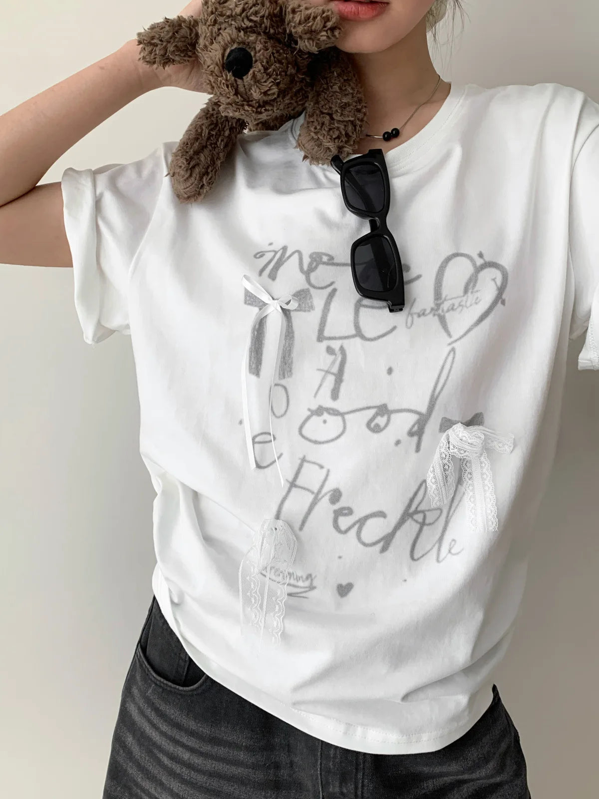 Aiertu  -  Summer new Korean loose letter printing lace bow decoration loose round neck short-sleeved T-shirt Aiertu