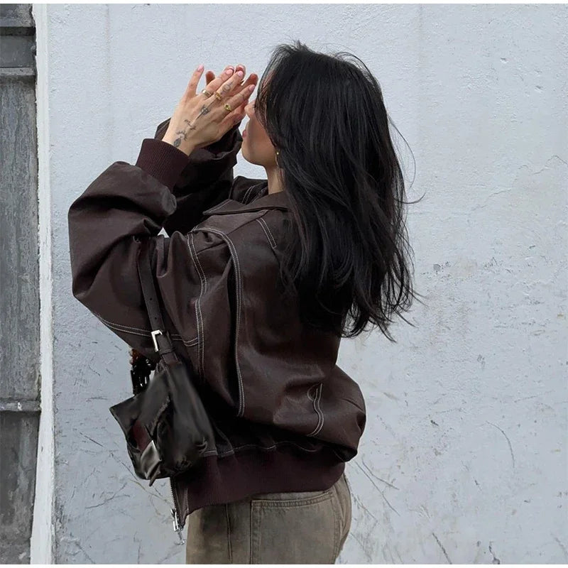 Aiertu  -  Loose Patchwork Leather Jackets Women Fashion Lapel Zipper Pockets Long Sleeve Coats 2026 Autumn New Female Chic Tops Streetwear Aiertu