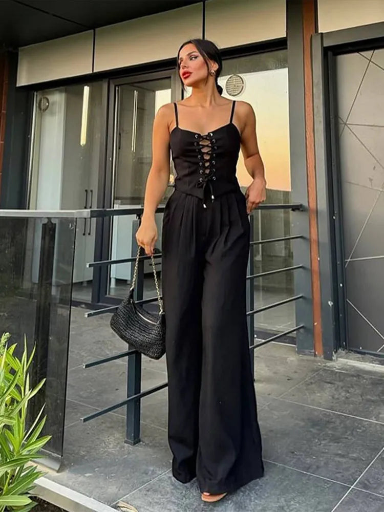 Aiertu  -  Strap Camisole Vest High Waist Pants Women Suit Sexy Hollow Top Straight Tube Loose trousers 2026 Summer Vacation Casual Set Aiertu
