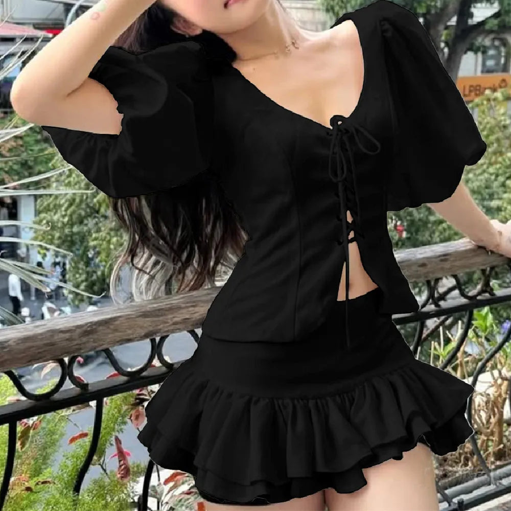 Aiertu  -  Summer eyelets Cross Lacing Up Bow Front Short Lantern Sleeve Shirt + Low Waist Package Hips Ruffles Hem Mini Skirt Sets Aiertu