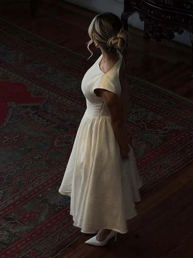 Aiertu  -  Elegant Pleated Dress Women O-neck Sleeveless Backless High Waist A-line Dresses Female 2025 Spring Summer Chic Casual Lady Robe Aiertu