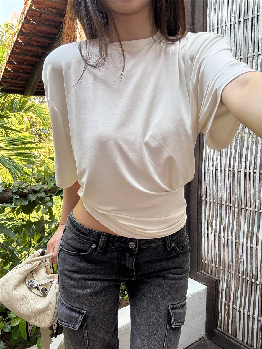 Aiertu  -  O-neck Pleated Asymmetric Casual Short-sleeved T-shirt Women 2026 Summer New High Street Fashion Solid Color All Match Tops Aiertu
