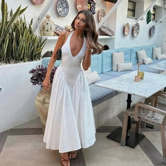 Aiertu  -  Sexy Deep V Hollow Halterneck Large Hem Dress For Women Solid High Waisted Backless Splice Summer New Vacation Long Dress Aiertu