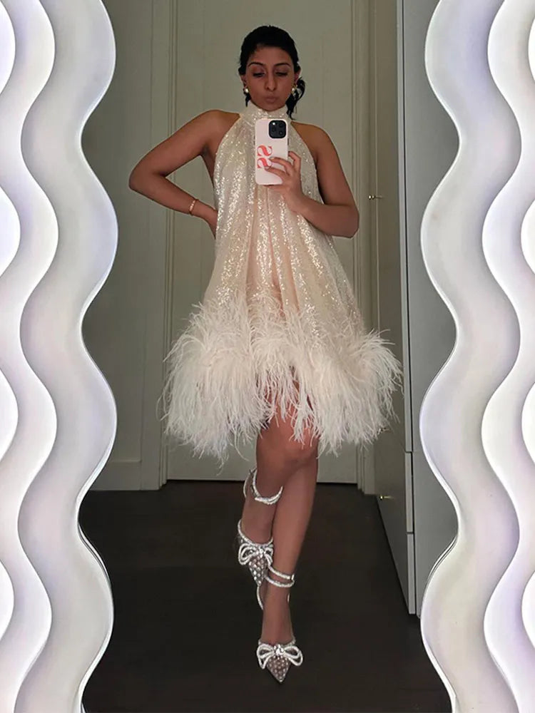 Aiertu  -  Elegant White Sequins Feather Hem Mini Dress Women Sexy Off Shoulder Loose Halter Dresses 2026 New Shiny Female Party Vestidos Aiertu