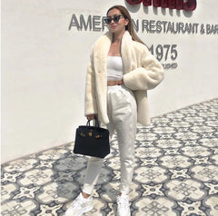 Aiertu  -  Winter Warm Plush Faux Fur Coat Women Thick Middle Long Overcoat Turn Down Collar Women Female Loose Faux Rabbit Fluffy Jacket Aiertu