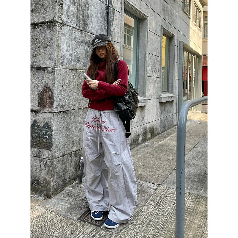 Aiertu  90s American Retro Trend Printed Letters Overalls Women Loose Fold High Street Korean Casual Sports Couple Wide leg Pants Unisex Aiertu