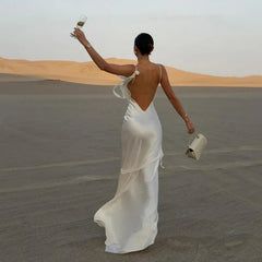 Aiertu  -  White Satin Backless Long Dress Women Sexy SleevelessTassels Flower Decor Bodycon Robes 2025 Elegant Holiday Party Maxi Dresses Aiertu
