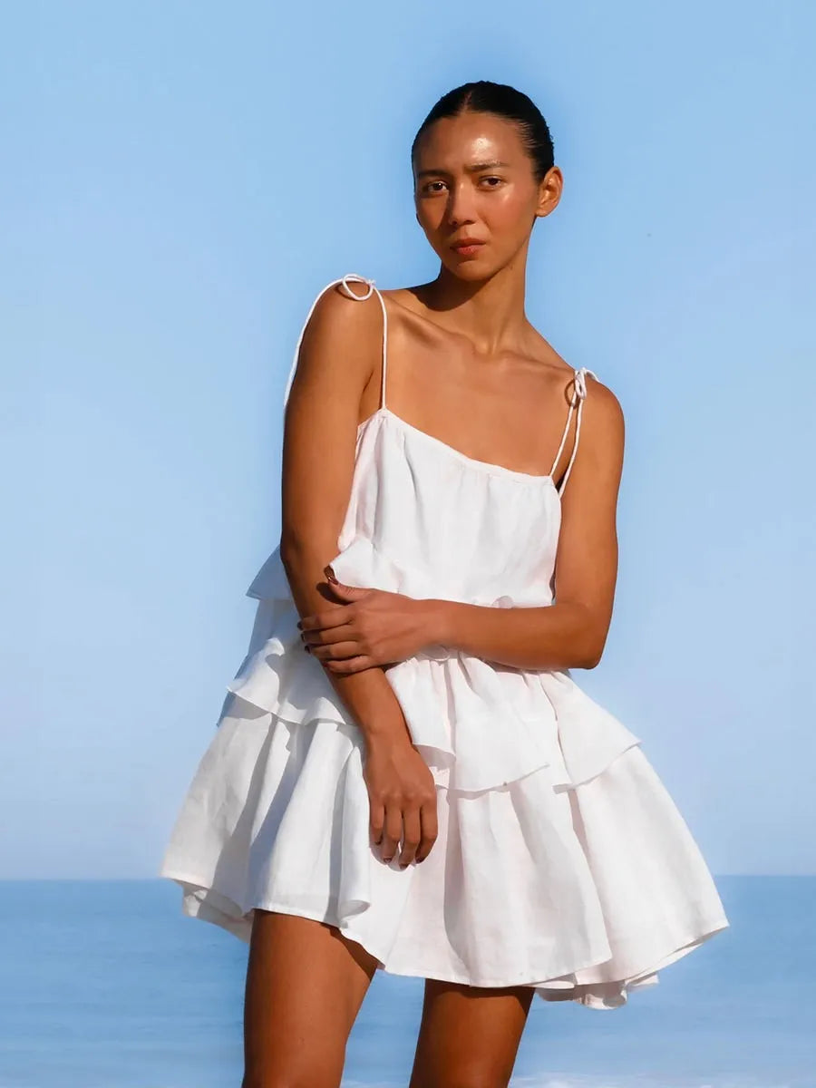 Aiertu  -  Summer Ruffle White Mini Dresses For Women 2026 New Slash Neck Sleeveless Backless Dress Sexy Fashion Holiday Suspender Dresses Aiertu