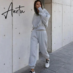 Fashion Spring and Autumn New Big Pocket Solid Color Drawstring Cap Corset Casual Two-piece Sweater Set Aiertu