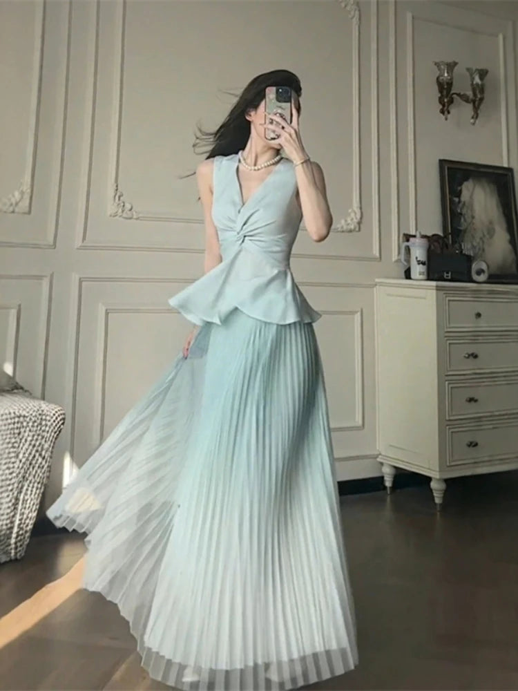 Aiertu  -  High-end temperament elegant set women spring summer V-neck sleeveless top pleated half body long skirt two-piece set Aiertu